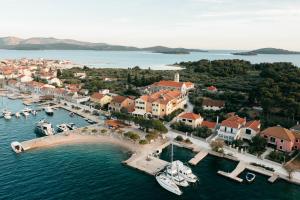 an aerial view of a small island in the water at Hotel Spongiola in Krapanj