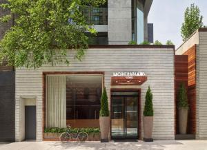 a store front of a building with two bikes parked outside at ModernHaus SoHo in New York