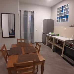 A kitchen or kitchenette at Dimitra apartments koroni