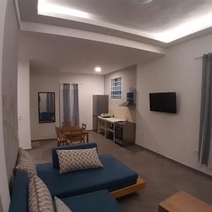 A television and/or entertainment centre at Dimitra apartments koroni