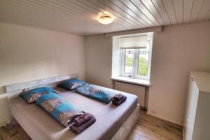 Ein Bett oder Betten in einem Zimmer der Unterkunft Cozy apartment close to Zurich Airport and City