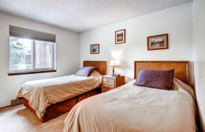 Postel nebo postele na pokoji v ubytování Mark IX #7 - Close to Town - Free Shuttle