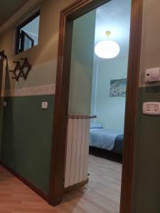 Postel nebo postele na pokoji v ubytování B&b L'Oasi del Vulture