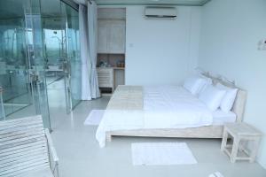Llit o llits en una habitació de Sky Pavilion