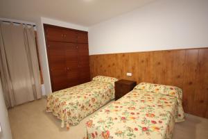 Cama o camas de una habitación en Apartamentos Rurales Campillo