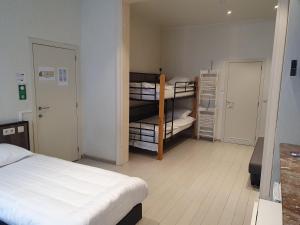 A bed or beds in a room at Albert - Rooms