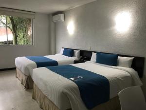Postel nebo postele na pokoji v ubytování Hotel Ros Gaud + 37 fotografií
