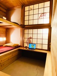 게스트하우스 모쿠모쿠 객실 이층 침대