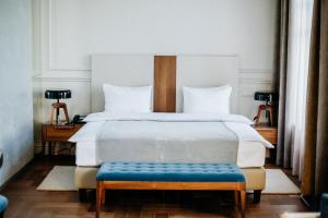 Кровать или кровати в номере Отель Амурский
