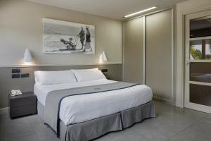 a bedroom with a large bed in a room at FeelFree STAYS Basoa in Donostia-San Sebastián