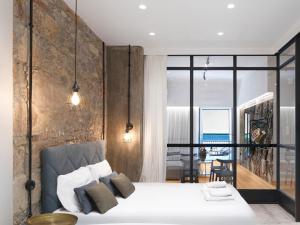 A bed or beds in a room at 5 star lux suite in Kolonaki.
