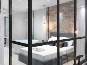 A bed or beds in a room at 5 star lux suite in Kolonaki.