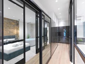 A bed or beds in a room at 5 star lux suite in Kolonaki.