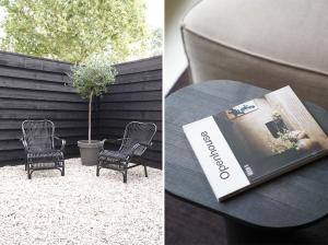 a book sitting on a table next to a table with chairs at Hotel âme in Rotterdam