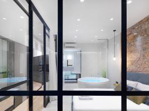 A bed or beds in a room at 5 star lux suite in Kolonaki.