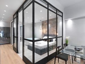 A bed or beds in a room at 5 star lux suite in Kolonaki.