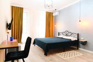 Ένα ή περισσότερα κρεβάτια σε δωμάτιο στο Hi Астана +15 φωτογραφίες