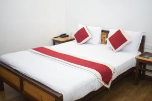 Postel nebo postele na pokoji v ubytování Altius Nest Hotel
