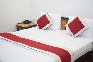 Postel nebo postele na pokoji v ubytování Altius Nest Hotel