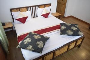 Postel nebo postele na pokoji v ubytování Altius Nest Hotel