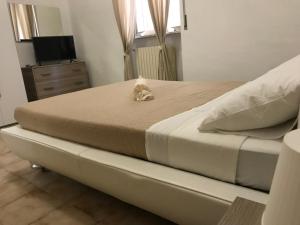 Postel nebo postele na pokoji v ubytování Casa Vacanze Mamarose