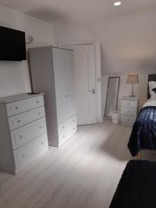 Postel nebo postele na pokoji v ubytování Doonan Breeze