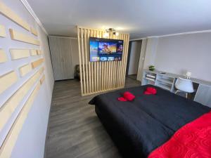 Łóżko lub łóżka w pokoju w obiekcie BNCK Wellness Residence