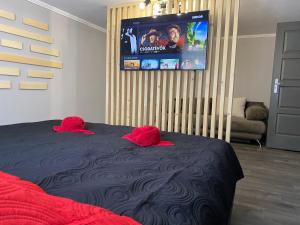Łóżko lub łóżka w pokoju w obiekcie BNCK Wellness Residence