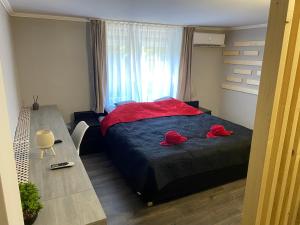 Łóżko lub łóżka w pokoju w obiekcie BNCK Wellness Residence