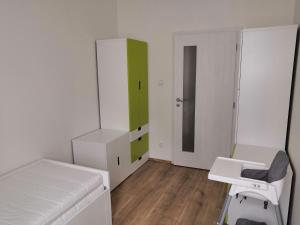 Postel nebo postele na pokoji v ubytování Znojmo apartmány