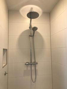 Ein Badezimmer in der Unterkunft Schippers Butz strandnah mit Whirpool