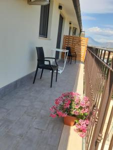 A balcony or terrace at Un passo dal mare - Guest House