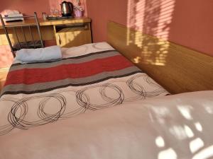 Katil atau katil-katil dalam bilik di Hotel Gól Prostějov