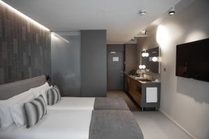 Cama ou camas em um quarto em Ohla Eixample