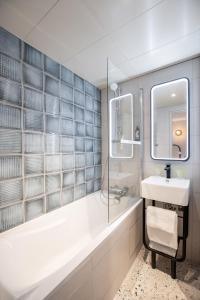 Ванна кімната в Hotel de L'Esperance