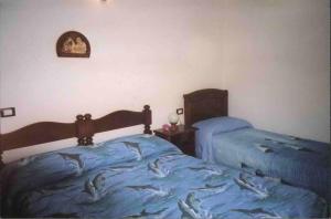 Postel nebo postele na pokoji v ubytování B&B Pivi