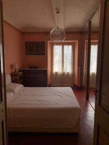 Een bed of bedden in een kamer bij Tenuta Fagnanetto