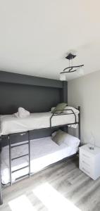 Posteľ alebo postele v izbe v ubytovaní Rooftop Casa Botes