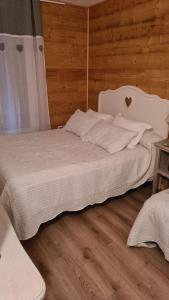 Katil atau katil-katil dalam bilik di Le Rêve blanc
