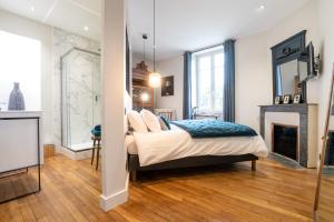 Edouard & Louise - Chambres d'hôtes客房内的一张或多张床位