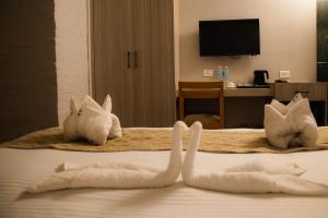 Voodi või voodid majutusasutuse Vastu Boutique Hotel toas