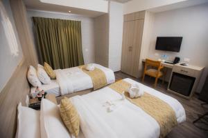 Voodi või voodid majutusasutuse Vastu Boutique Hotel toas