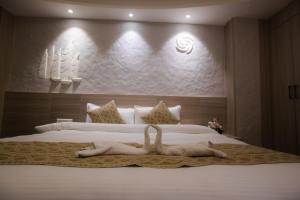 Voodi või voodid majutusasutuse Vastu Boutique Hotel toas