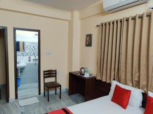 Postel nebo postele na pokoji v ubytování Sanjiva Suites + 29 fotografií