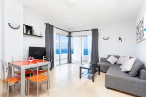 TV a/nebo společenská místnost v ubytování Paradise Beach Suite
