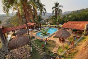 an aerial view of a resort with a swimming pool at Pousada Pé da Serra in Lindóia