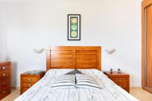 Postel nebo postele na pokoji v ubytování Paradise Beach Suite