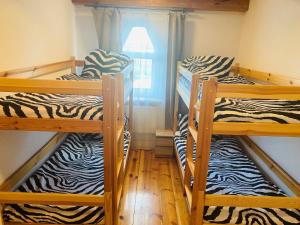 Posteľ alebo postele v izbe v ubytovaní Hostel Białystok Centrum