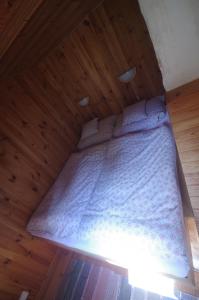 Postel nebo postele na pokoji v ubytování Chalupa Skalka