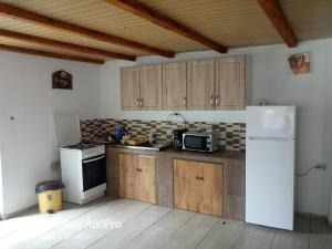 Kuchyň nebo kuchyňský kout v ubytování Casa Mari